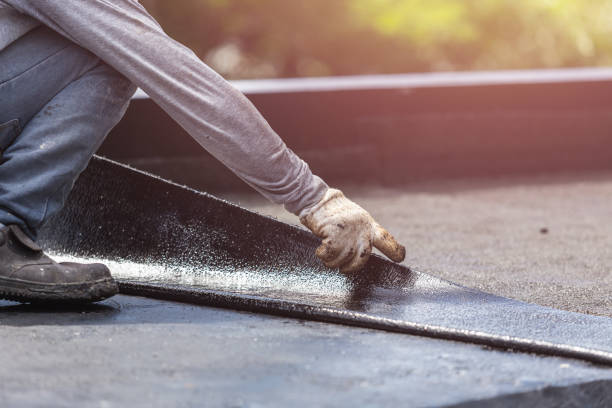 Professional Waterproofing technician working in Port Jefferson, OH
